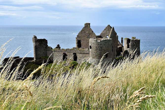 2-Day Northern Ireland Rail Tour: Belfast, Antrim Coast, and Giant's Causeway - Meals, timing, and what to pack for a cold, windy coast
