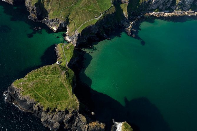 2-Day Northern Ireland Tour from Dublin Including Belfast and Giants Causeway - Day 1: Monasterboice’s round tower and 9th-century Celtic crosses