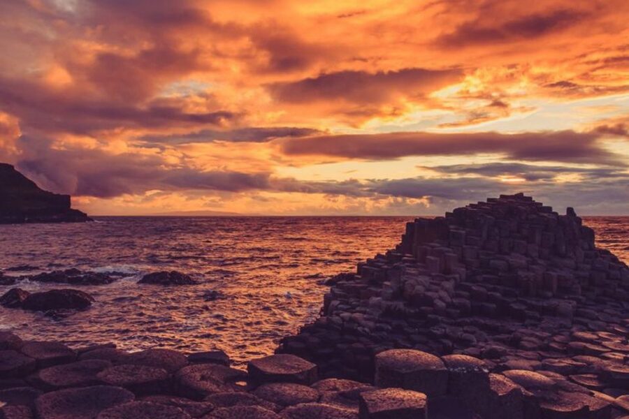 Dublin: Giant's Causeway, Dark Hedges & Titanic Guided Tour - Dunluce Castle ruins: short stop, big drama from the cliffs