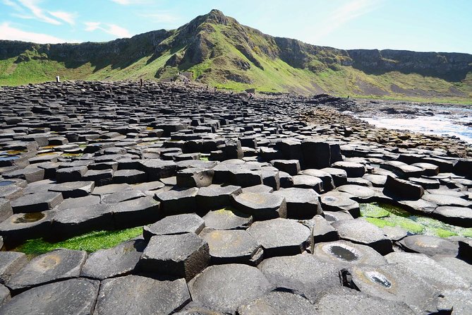 Dublin to Belfast Titanic, Dunluce Castle & Giant's Causeway Tour - Morning pickup and coach comfort on the way north