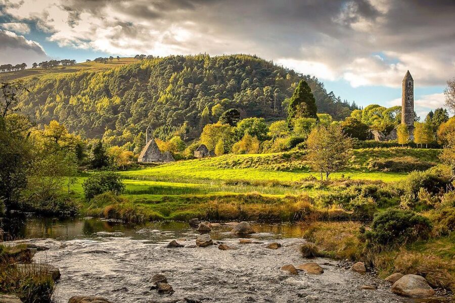 From Dublin: Glendalough & Wicklow Mountains Morning Tour - Leaving Dublin: city views, countryside chatter, and film locations