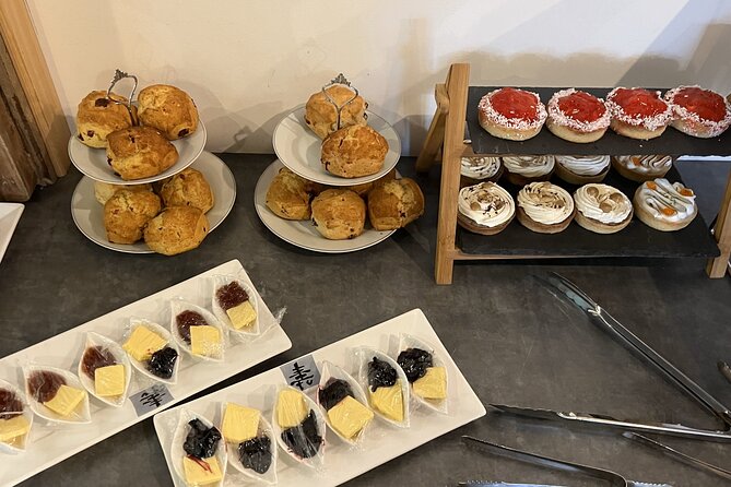 Gin Tasting and Afternoon Tea Delight in Dublin Ireland - Afternoon tea with cakes and sandwiches that keep you going